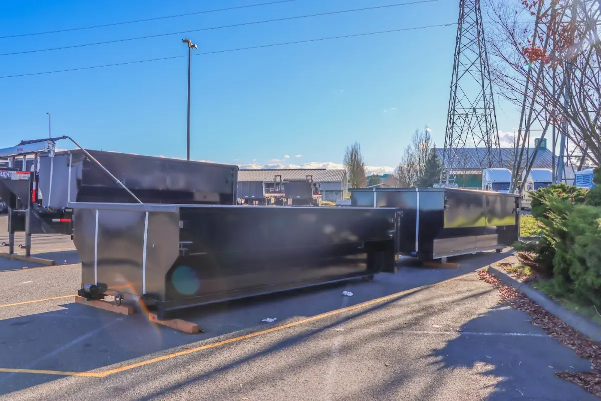 Roll-off dumpster ready for waste disposal at job site for Residential Dumpster Rental in New London